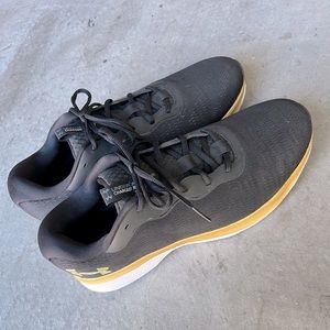 Black & Gold Under Armour gym shoes